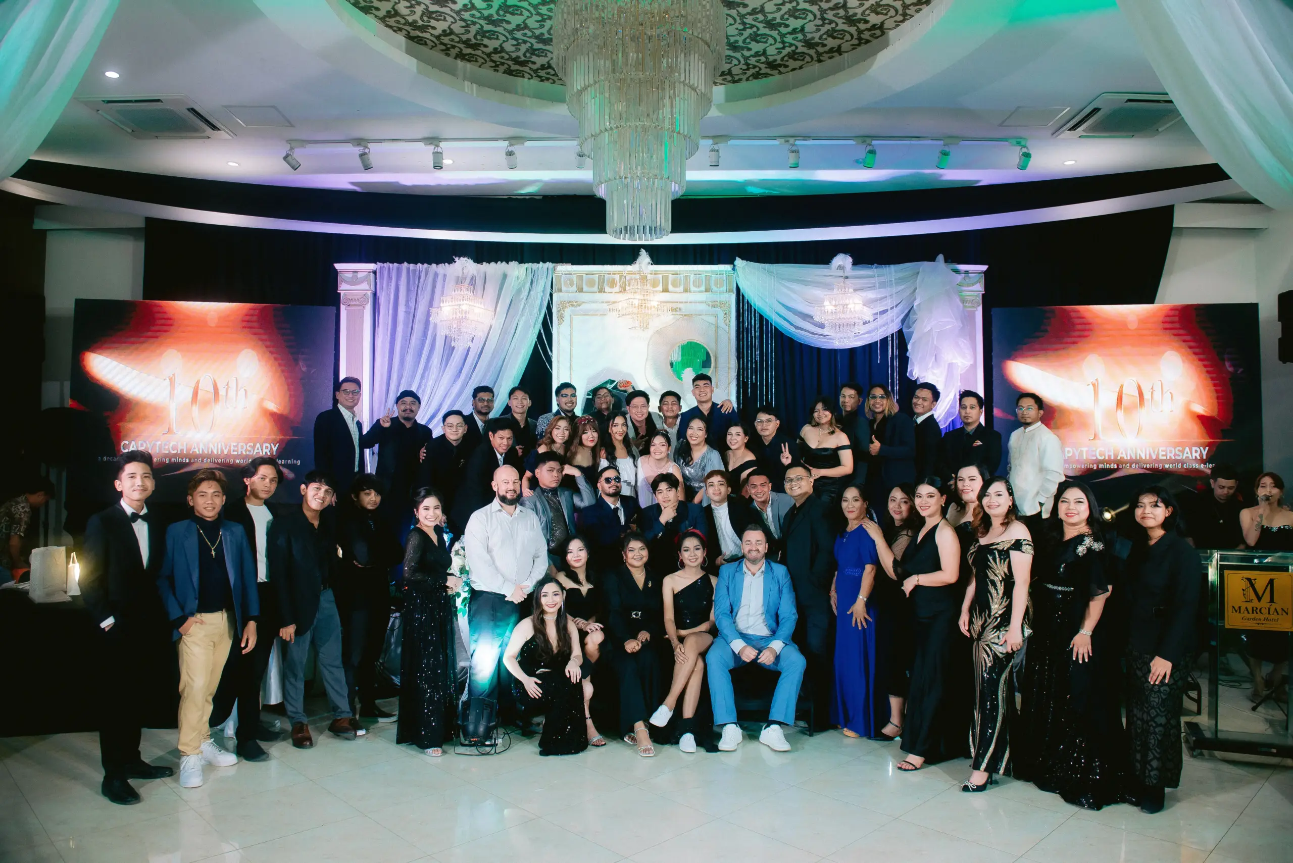 The Capytech team on stage at the 10th Anniversary ball celebration, Capytech UK